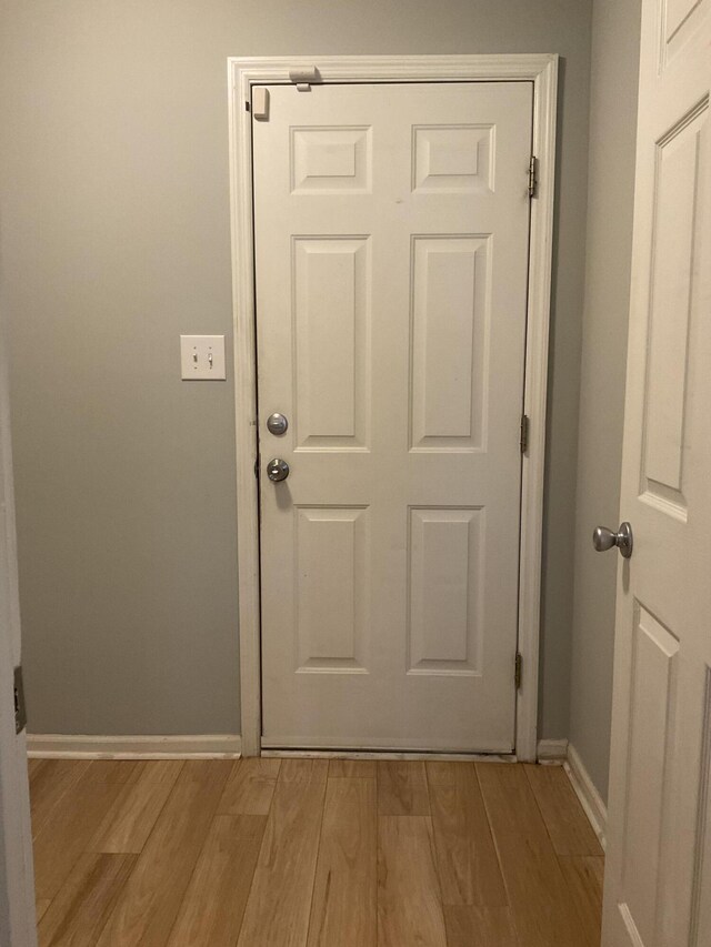 1129 Waltons Trl, Hephzibah, GA 30815 - doorway to outside featuring light wood-style floors and baseboards