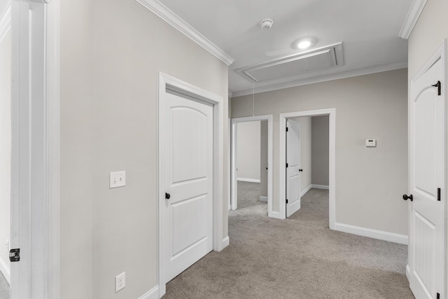 hall with light carpet and crown molding