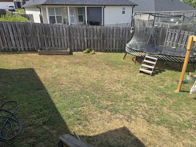 318 Elbrus Way, Grovetown, GA 30813 - fenced backyard featuring a trampoline