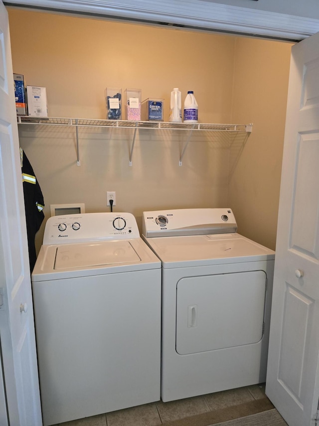 318 Elbrus Way, Grovetown, GA 30813 - washroom with washer and dryer and dark tile patterned floors