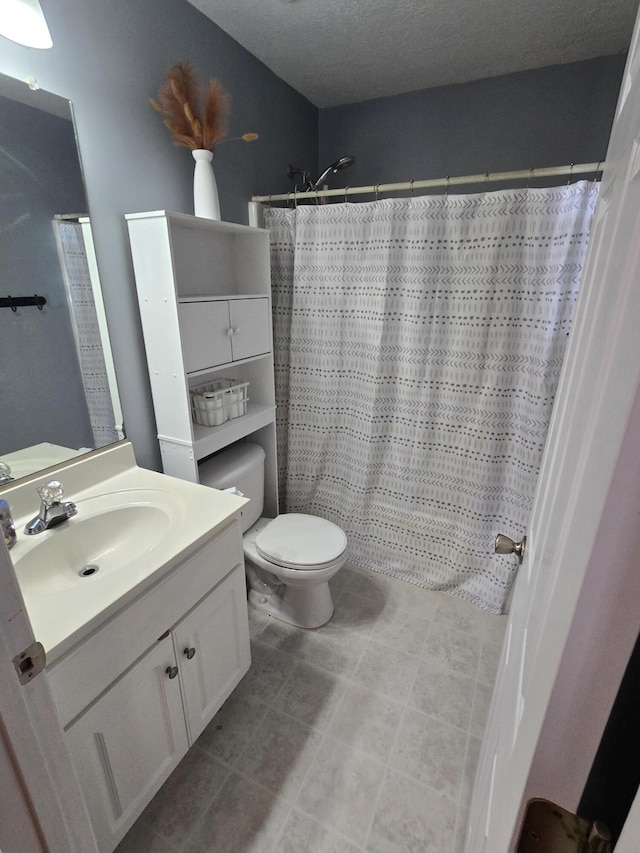 318 Elbrus Way, Grovetown, GA 30813 - bathroom featuring vanity, a textured ceiling, and curtained shower