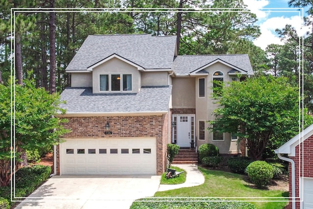 126 Hunters Run Dr, Aiken, SC 29803 - traditional home featuring stucco siding, roof with shingles, concrete driveway, and an attached garage