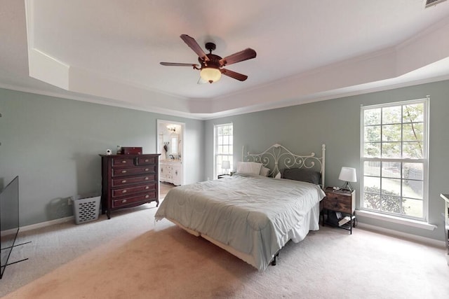 5209 Windmill Ct, Evans, GA 30809 - carpeted bedroom featuring a raised ceiling, multiple windows, ornamental molding, baseboards, and ceiling fan
