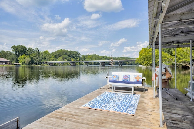 view of dock with a water view