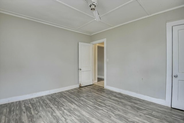 spare room with hardwood / wood-style flooring