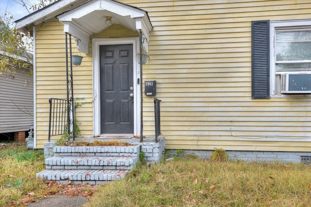 view of exterior entry with cooling unit