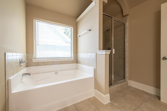 1217 Berkley Hills Pass, Evans, GA 30809 - bathroom with a bath, tile patterned floors, a shower stall, and baseboards
