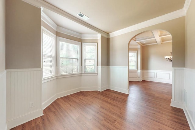 1217 Berkley Hills Pass, Evans, GA 30809 - spare room with arched walkways, a wainscoted wall, healthy amount of natural light, wood finished floors, and crown molding
