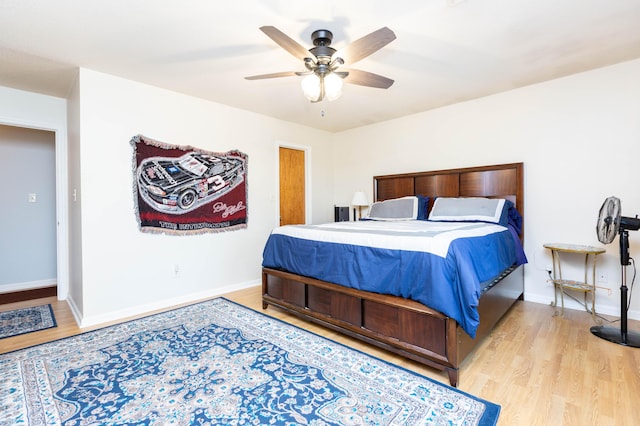 bedroom featuring ceiling fan and light wood-type flooring