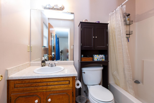 full bathroom with shower / bathtub combination with curtain, vanity, and toilet