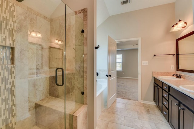 bathroom with a stall shower, visible vents, a sink, and lofted ceiling