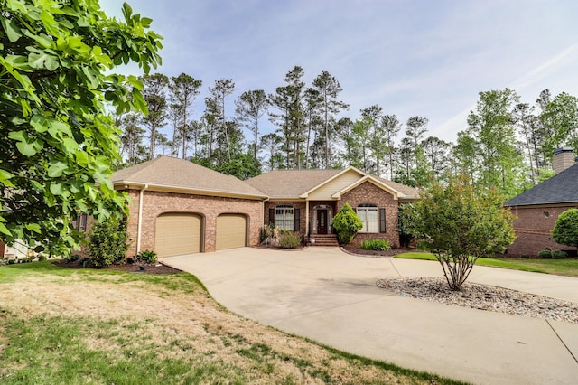 148 Grandview Dr, Mccormick, SC 29835 - ranch-style home with roof with shingles, an attached garage, driveway, brick siding, and a front yard