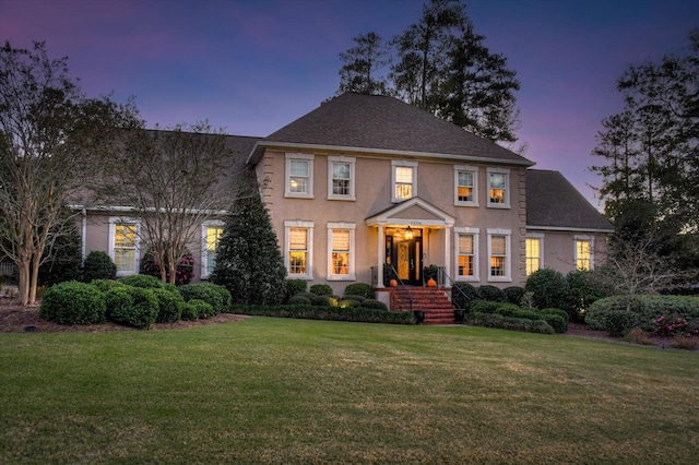 colonial house with a lawn