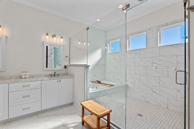 full bath with vanity, marble finish floor, a shower stall, and crown molding