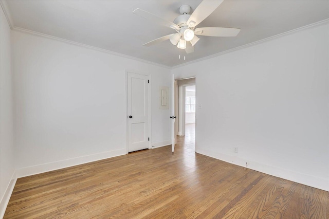 unfurnished room featuring ceiling fan, ornamental molding, and light hardwood / wood-style flooring