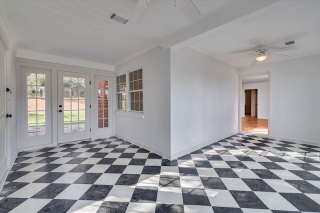 interior space with beam ceiling, french doors, and wooden ceiling