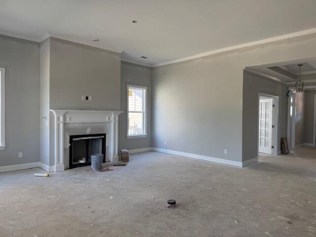 318 Holly Oak Way Unit Sc68, Grovetown, GA 30813 - unfurnished living room featuring ornamental molding, baseboards, and a fireplace