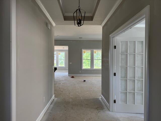 318 Holly Oak Way Unit Sc68, Grovetown, GA 30813 - corridor featuring crown molding, baseboards, and a tray ceiling