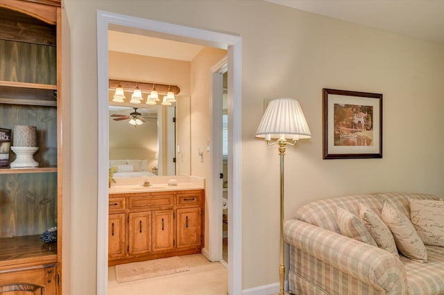bathroom with vanity and ceiling fan