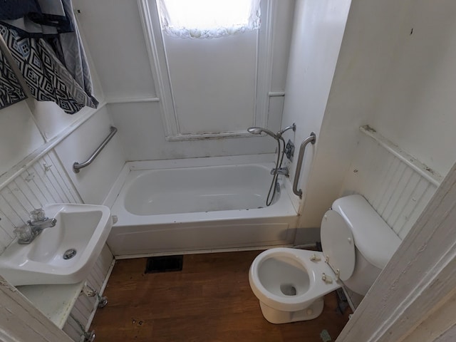 1316 Druid Park Ave, Augusta, GA 30904 - bathroom with toilet, a sink, and wood finished floors