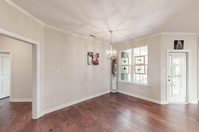 unfurnished dining area featuring visible vents, ornamental molding, baseboards, a chandelier, and dark wood finished floors