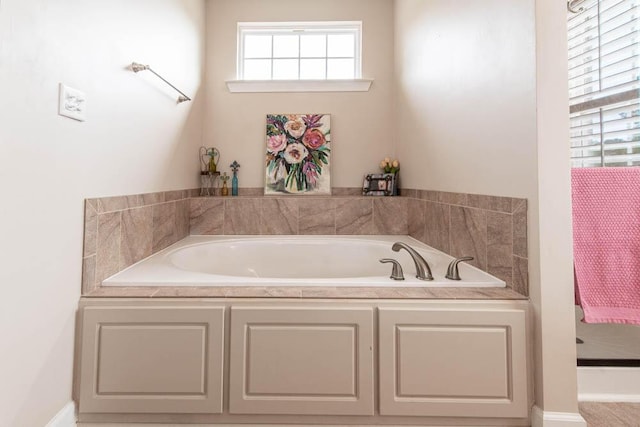 bathroom featuring a bath
