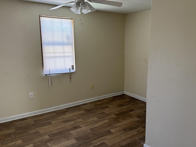 unfurnished room featuring ceiling fan and dark hardwood / wood-style flooring