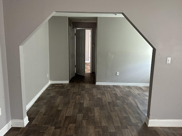 bonus room featuring dark hardwood / wood-style flooring