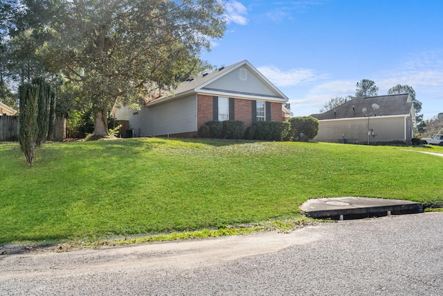 view of front of home with a front lawn