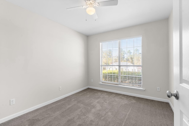 carpeted empty room with ceiling fan