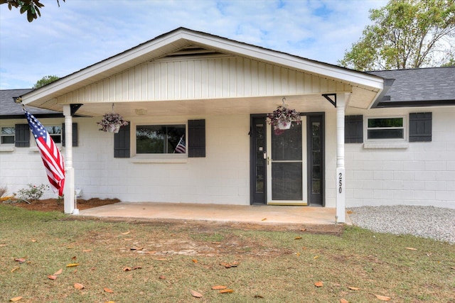 bungalow-style house with a front lawn