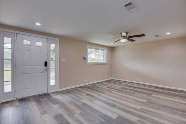 foyer entrance featuring ceiling fan and light hardwood / wood-style floors