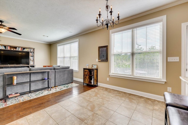 5558 Connor Dr, Evans, GA 30809 - living room with ornamental molding, healthy amount of natural light, a chandelier, a ceiling fan, and tile patterned flooring