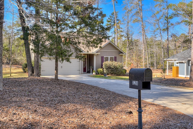 view of front of home with driveway and an attached garage