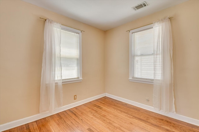 2125 Silverdale Rd, Augusta, GA 30906 - unfurnished room with baseboards, visible vents, and light wood-type flooring