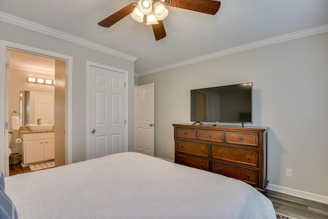 315 Coastal Cv, Mccormick, SC 29835 - bedroom featuring a sink, crown molding, wood finished floors, baseboards, and ensuite bath