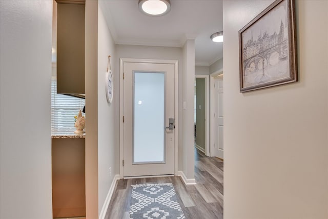 315 Coastal Cv, Mccormick, SC 29835 - entryway featuring wood finished floors, crown molding, and baseboards