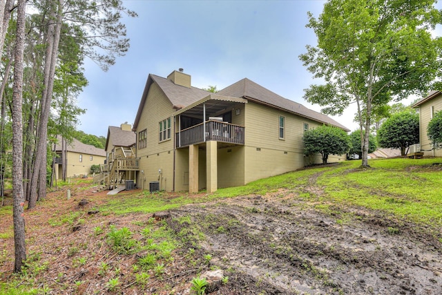 315 Coastal Cv, Mccormick, SC 29835 - back of property featuring a chimney, central air condition unit, a deck, and roof with shingles