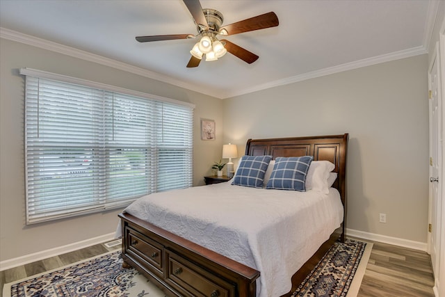 315 Coastal Cv, Mccormick, SC 29835 - bedroom featuring wood finished floors, ornamental molding, baseboards, and ceiling fan
