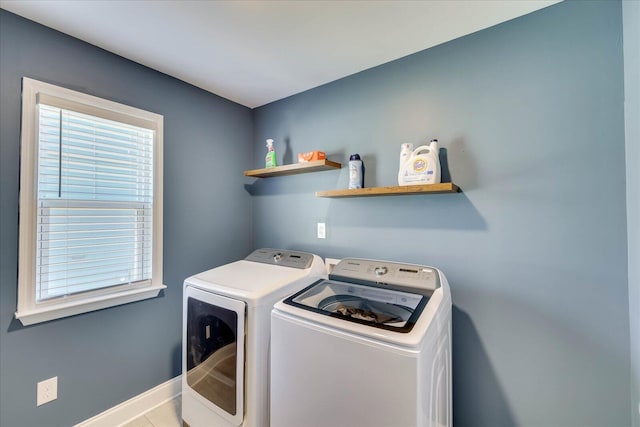 laundry area featuring independent washer and dryer