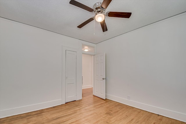 1847 Warren St, Augusta, GA 30904 - spare room featuring light wood-type flooring, a ceiling fan, and baseboards