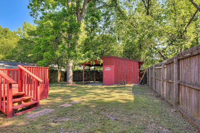 1847 Warren St, Augusta, GA 30904 - view of yard featuring an outdoor structure, a fenced backyard, and a storage shed