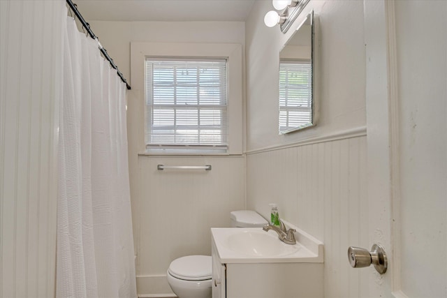 1847 Warren St, Augusta, GA 30904 - bathroom with vanity, toilet, and a shower with curtain