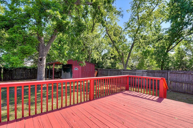 1847 Warren St, Augusta, GA 30904 - wooden terrace with a fenced backyard, a storage unit, an outbuilding, and a lawn