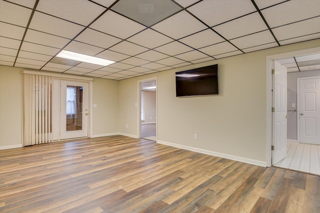 empty room with hardwood / wood-style flooring