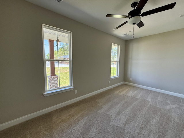 213 Whiskey Rd, Grovetown, GA 30813 - spare room with a wealth of natural light, baseboards, light colored carpet, and ceiling fan