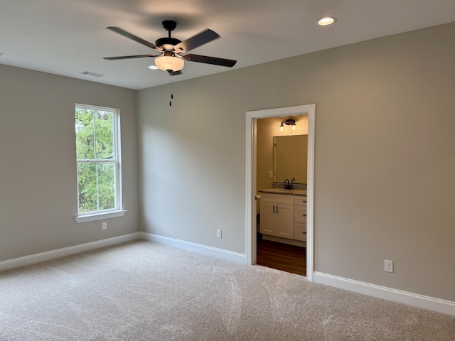 213 Whiskey Rd, Grovetown, GA 30813 - interior space featuring visible vents, baseboards, connected bathroom, recessed lighting, and dark carpet