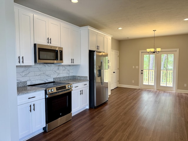 213 Whiskey Rd, Grovetown, GA 30813 - kitchen featuring white cabinetry, backsplash, dark wood-type flooring, and stainless steel appliances