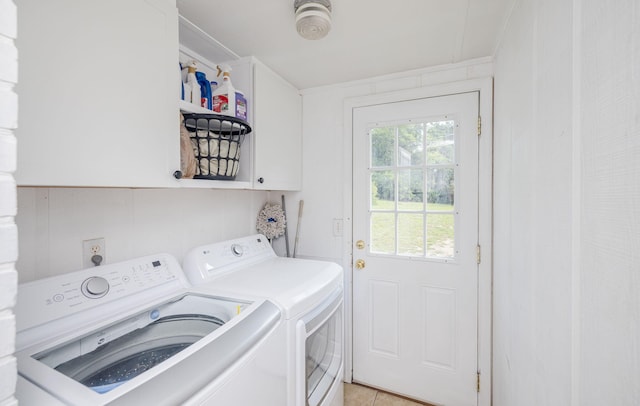 2217 Montclair St, Augusta, GA 30904 - laundry room with washing machine and clothes dryer, cabinet space, and light tile patterned floors