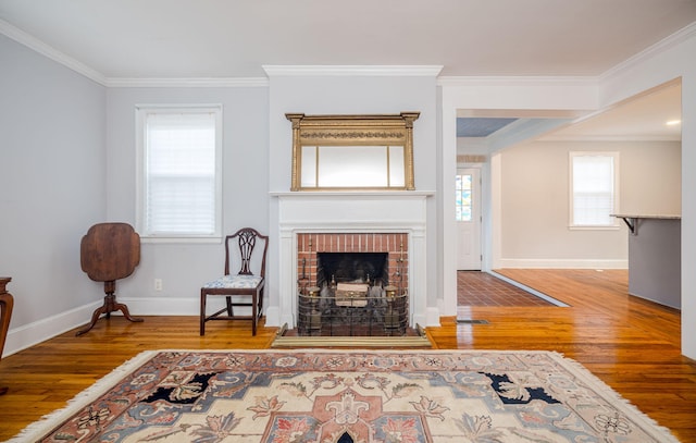 2217 Montclair St, Augusta, GA 30904 - living area featuring hardwood / wood-style floors, ornamental molding, and a fireplace